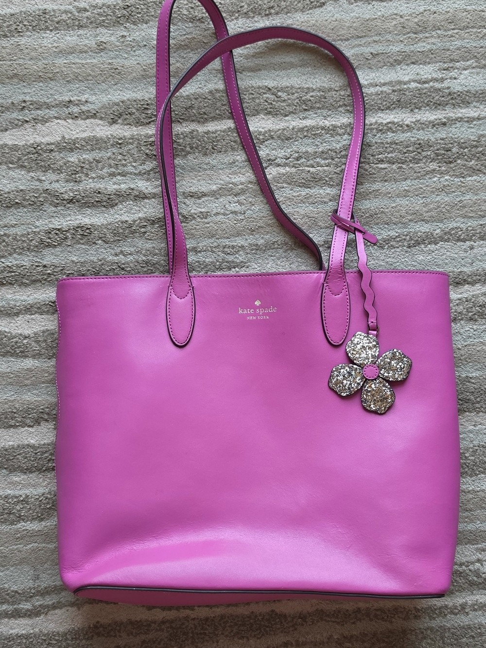 kate spade pink leather tote with glitter flower charm